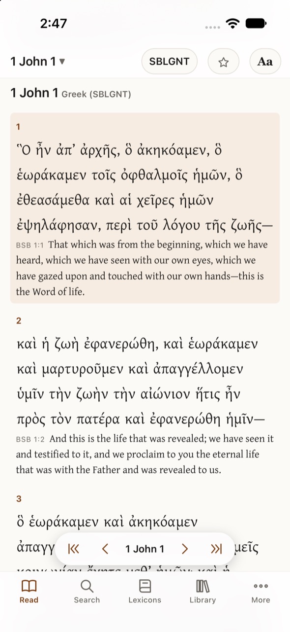 Hermeneus on the iPhone: 1 John 1 in Greek with the English under each verse, and the tab bar Read, Search, Lexicons, Library, More.